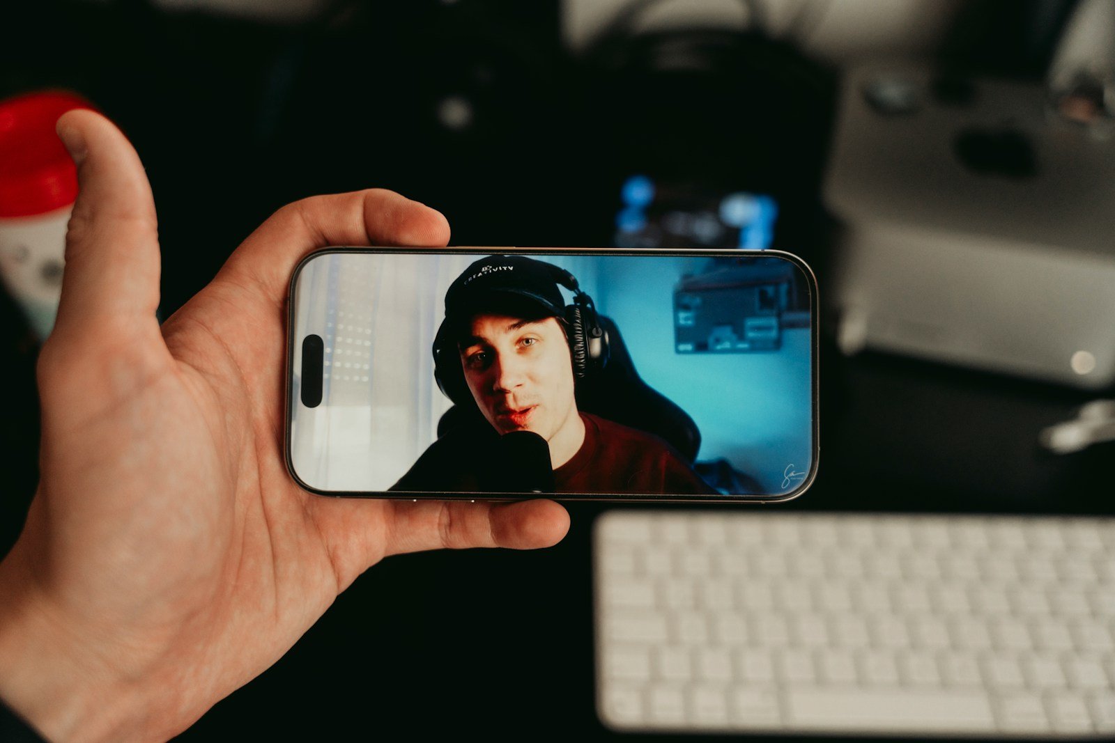 Person watching a live stream on their phone.