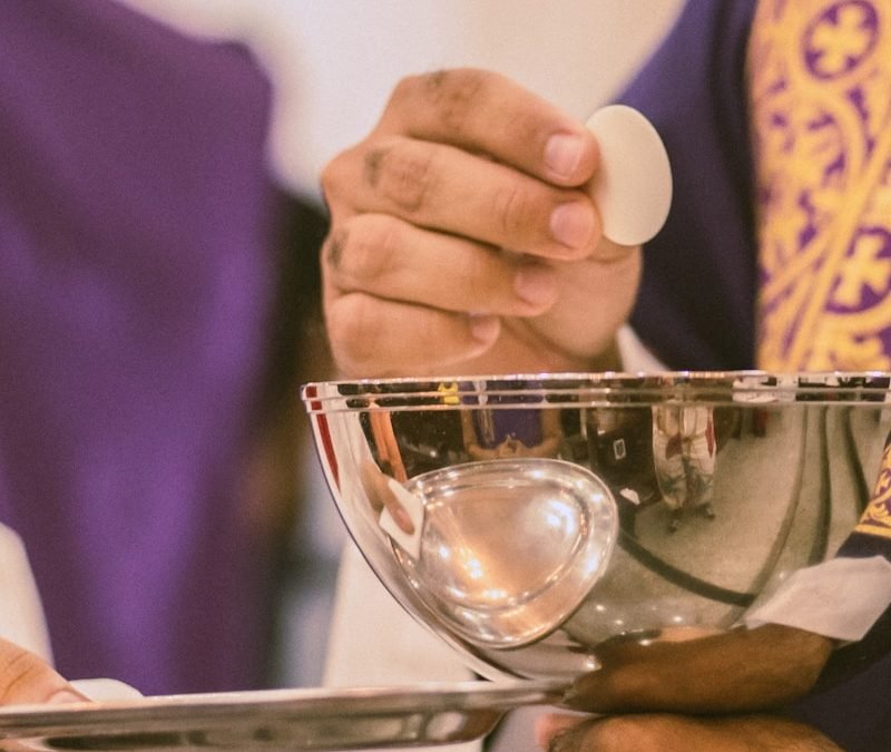 a close up of a person holding a bowl
